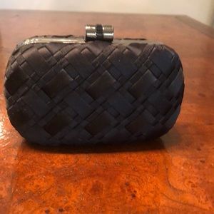 Black satin braided evening bag.
